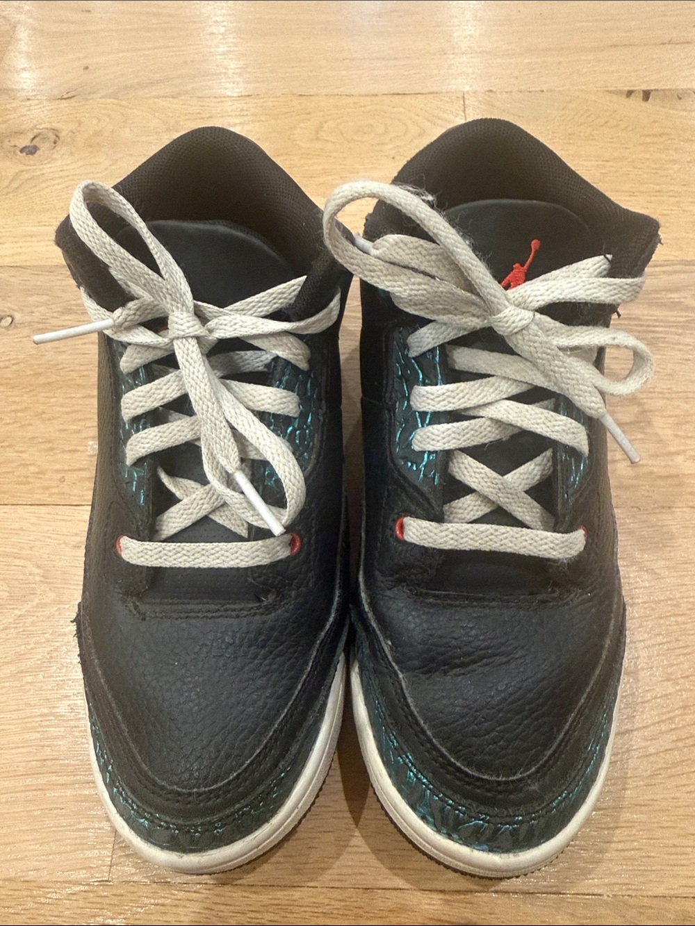 Nike Jordan Kids Black Sneakers with White Laces and Teal Stitching